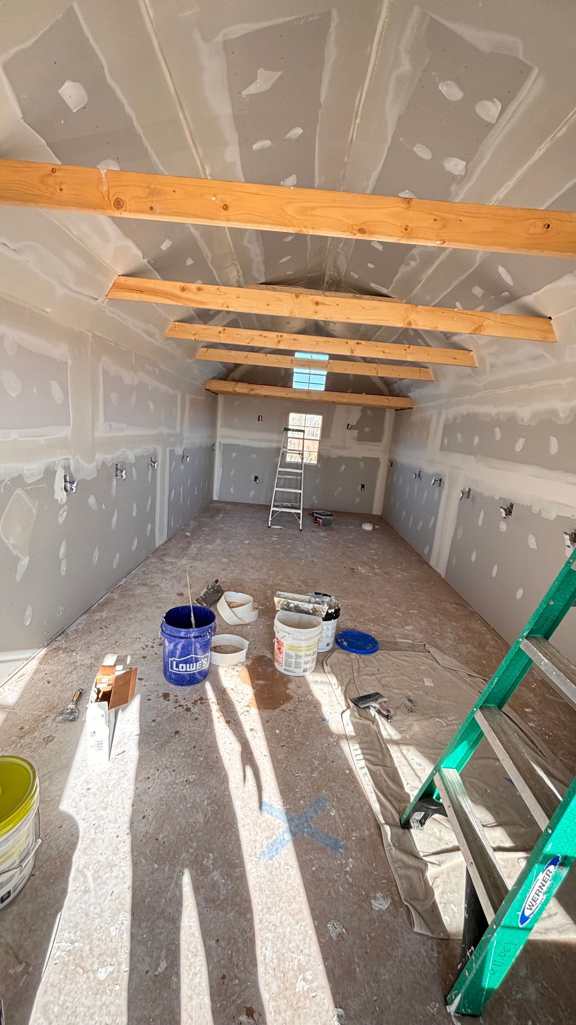 There is a ladder in the middle of the room.