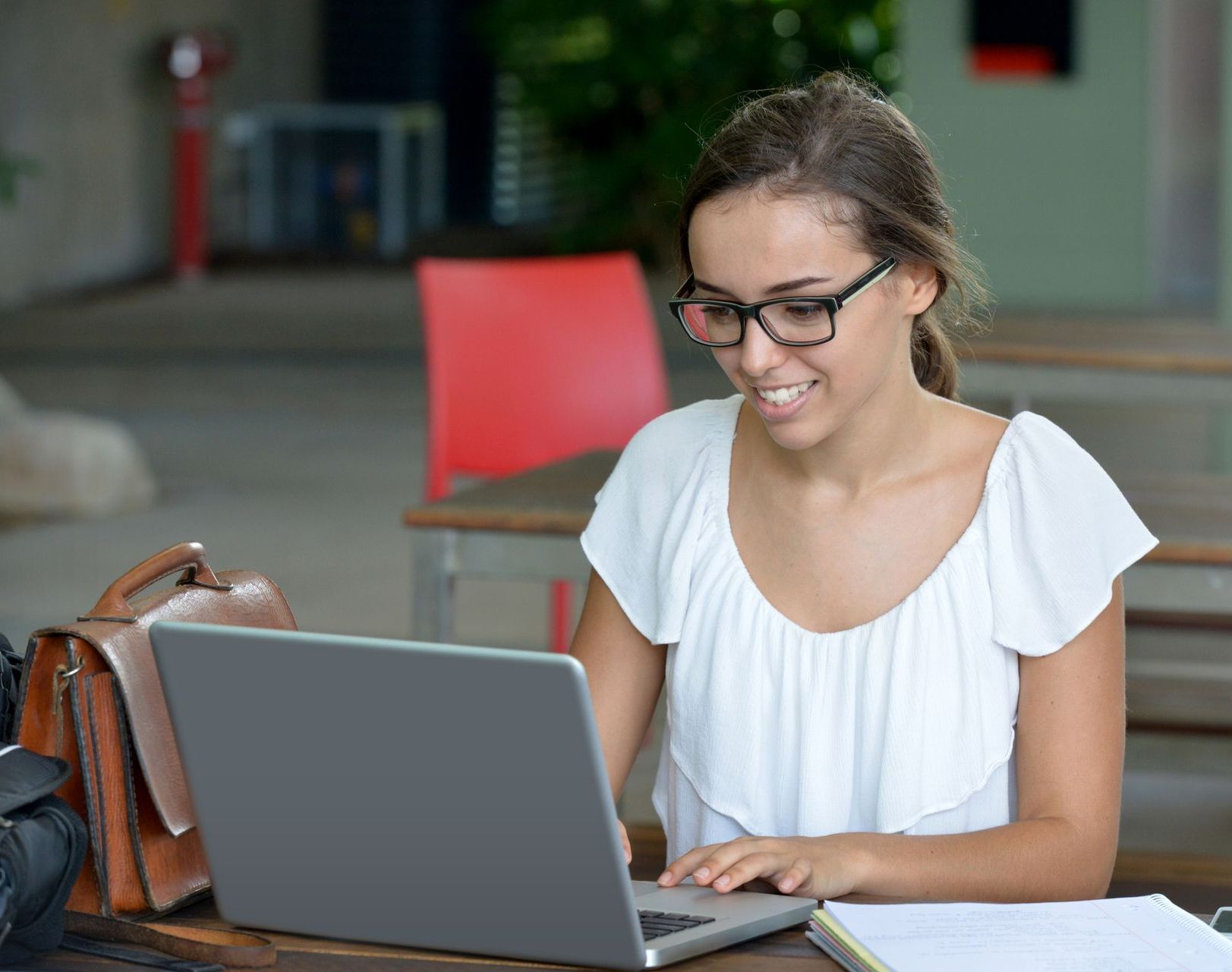 Girl with laptop — Pocatello, ID — The Eye Clinic