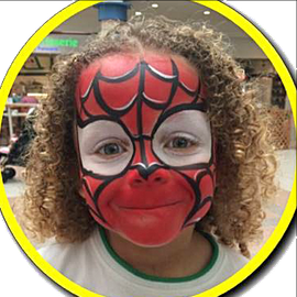 Boy with spiderman face paint