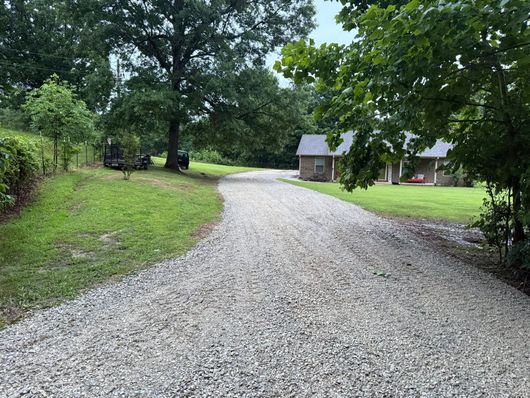freshly poured gravel driveway