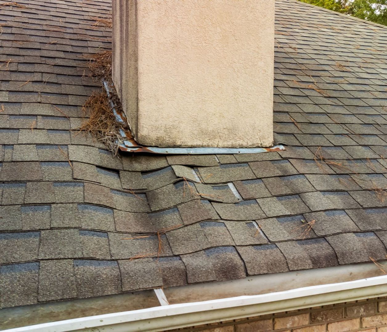 A roof with a chimney on top of it