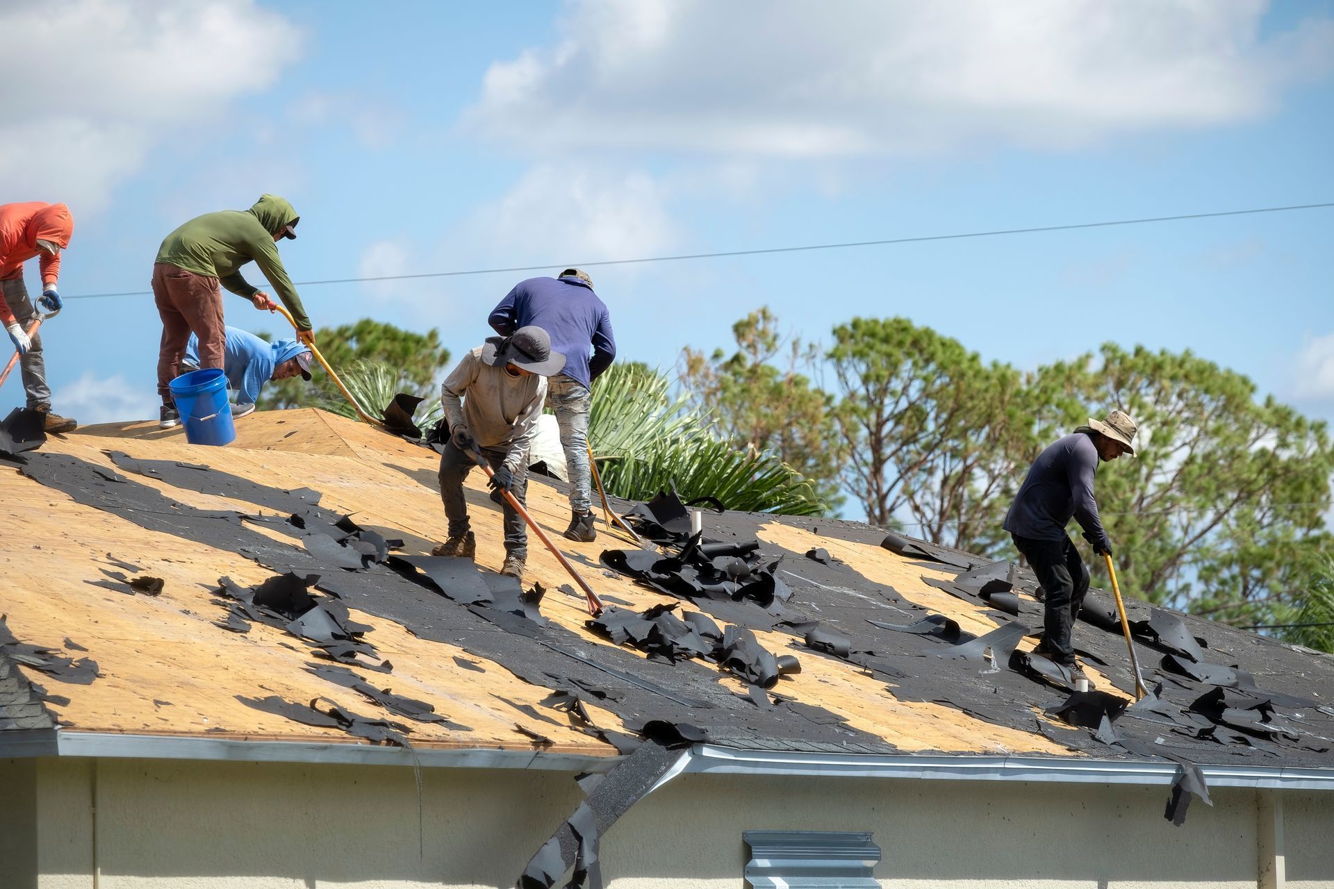 Bald eagle team replacing a roof in Opelika, AL