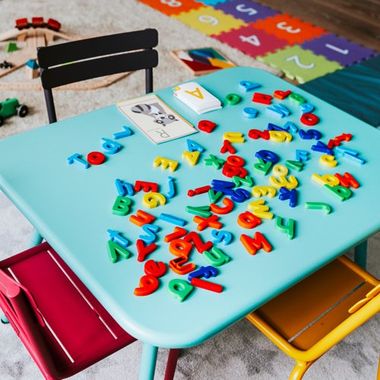 Alphabet Scattered on the Table — Cheyenne, WY — The Backyard Child Care Center