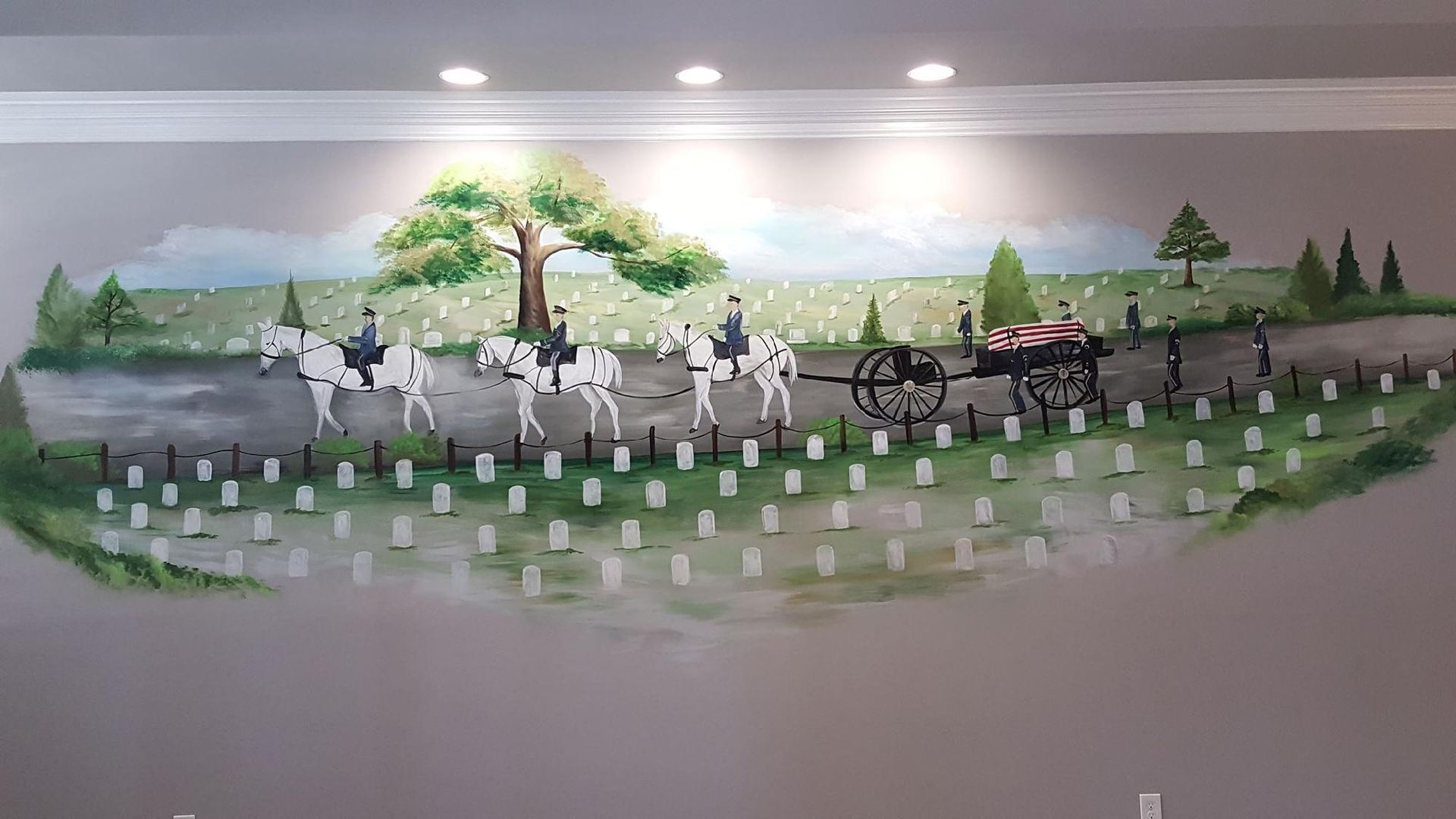 Mural: horses, carriage, riders, and a casket on a road beside a field of white grave markers.
