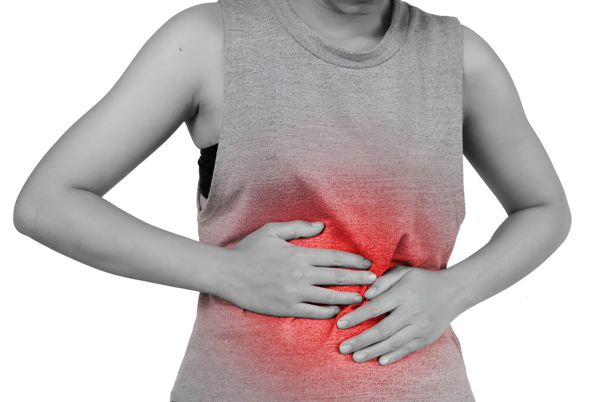 A Woman is Holding Her Stomach in Pain — Brisbane Upper GI Surgery in Chermside, QLD