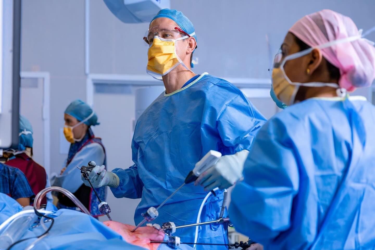 A Group of Surgeons are Operating on a Patient in an Operating Room — Brisbane Upper GI Surgery in Chermside, QLD