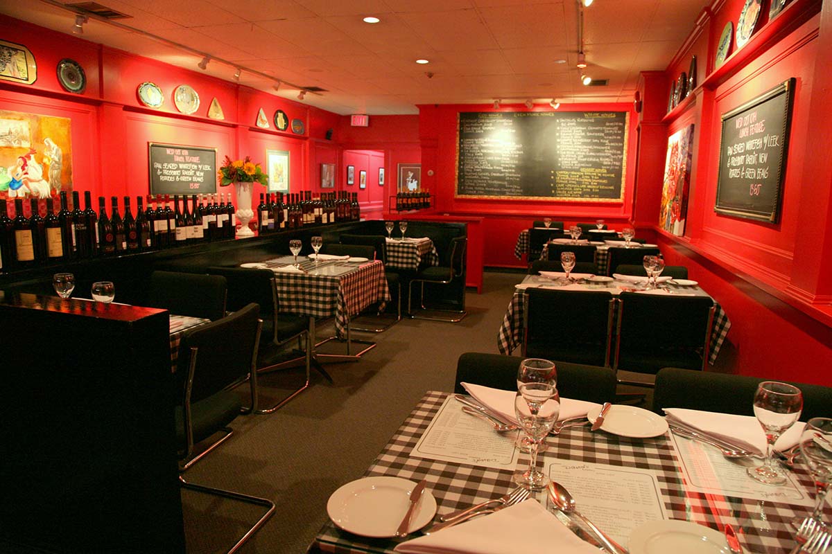 a restaurant with a lot of tables and chairs