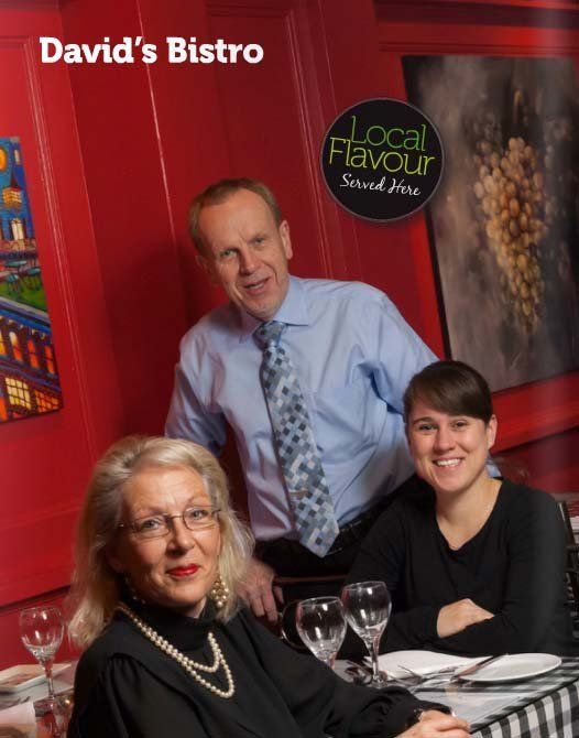 a poster for david 's bistro shows a man and two women