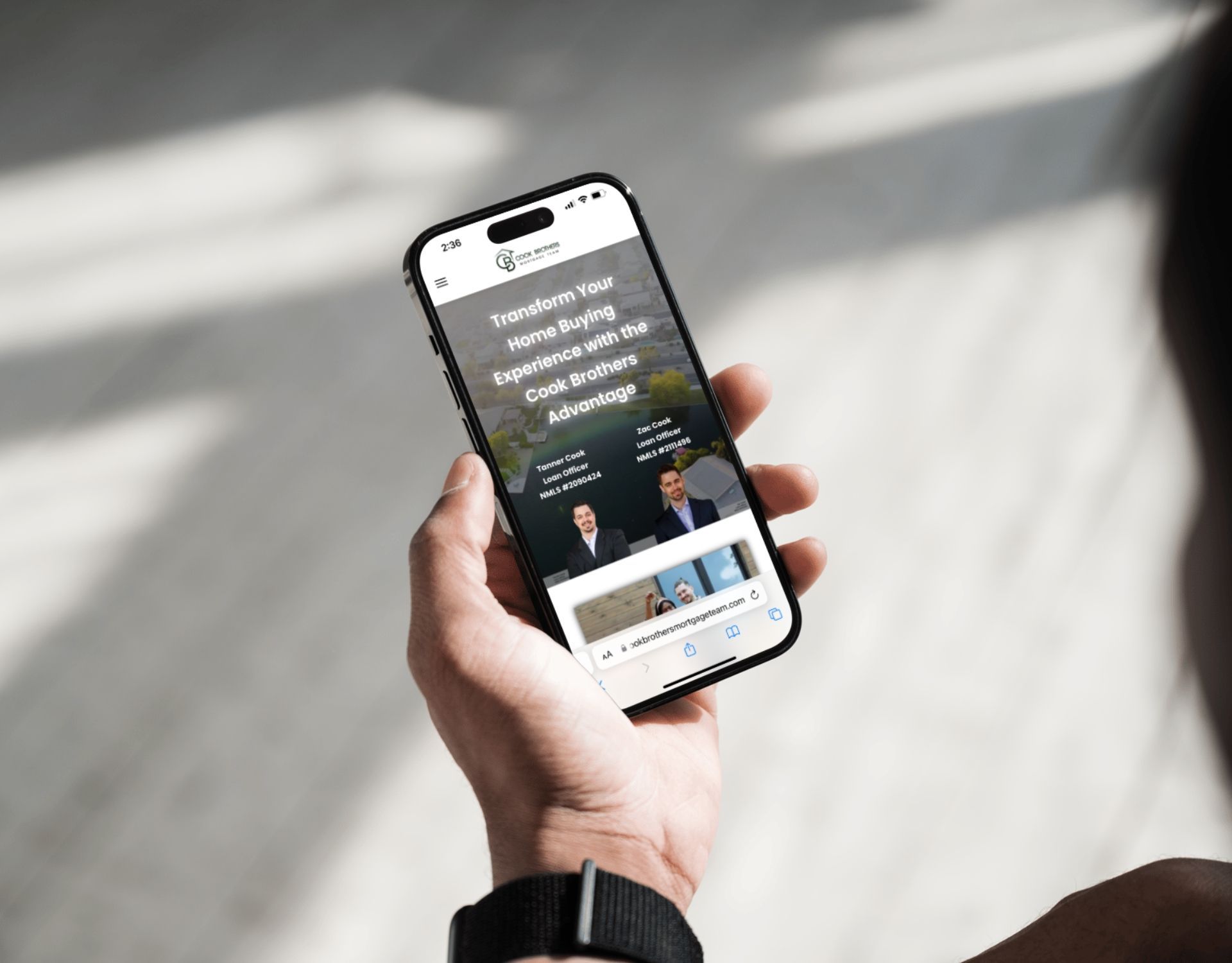 A person is holding a cell phone in their hand.