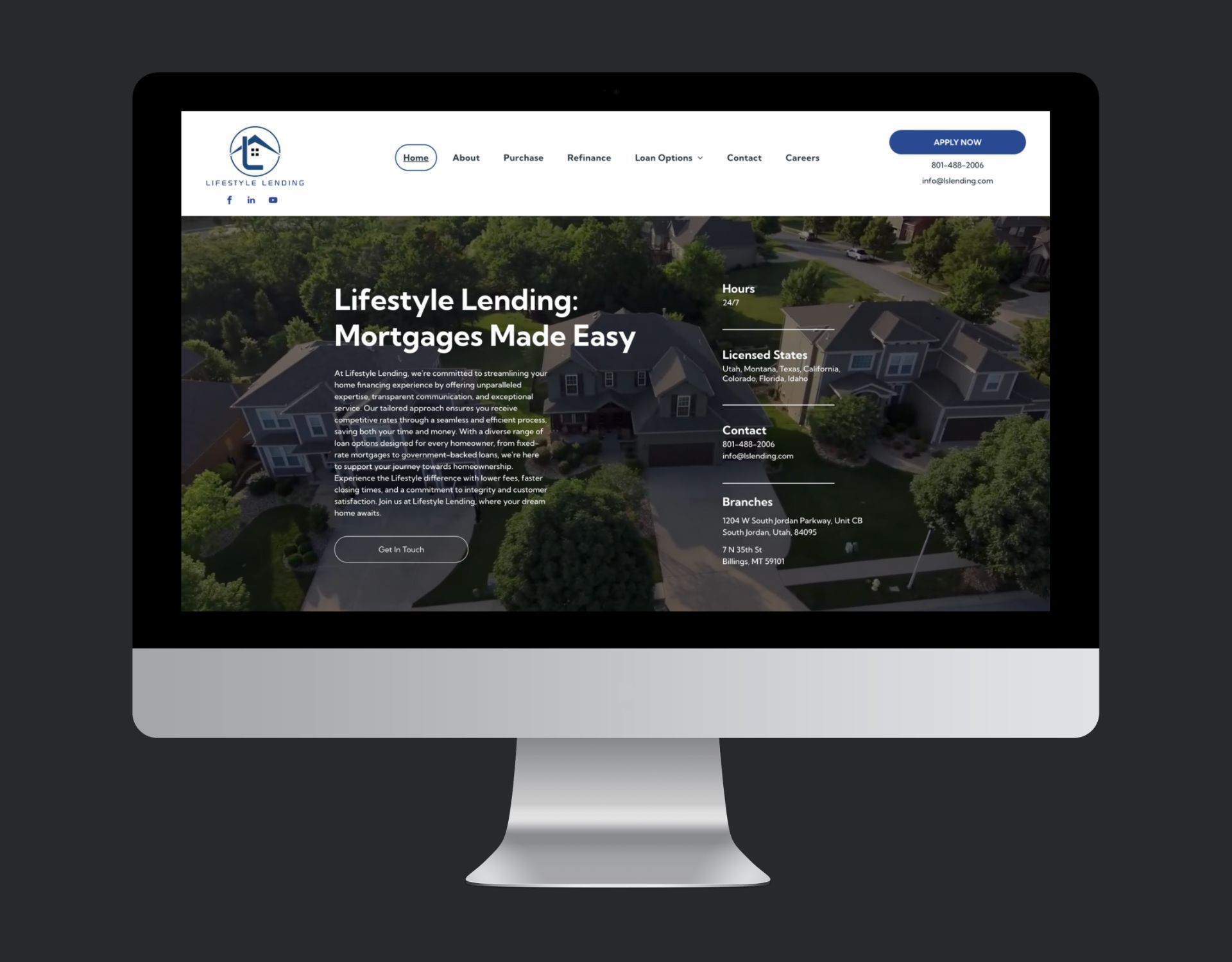 A computer monitor is displaying a website for lifestyle lending mortgages made easy.