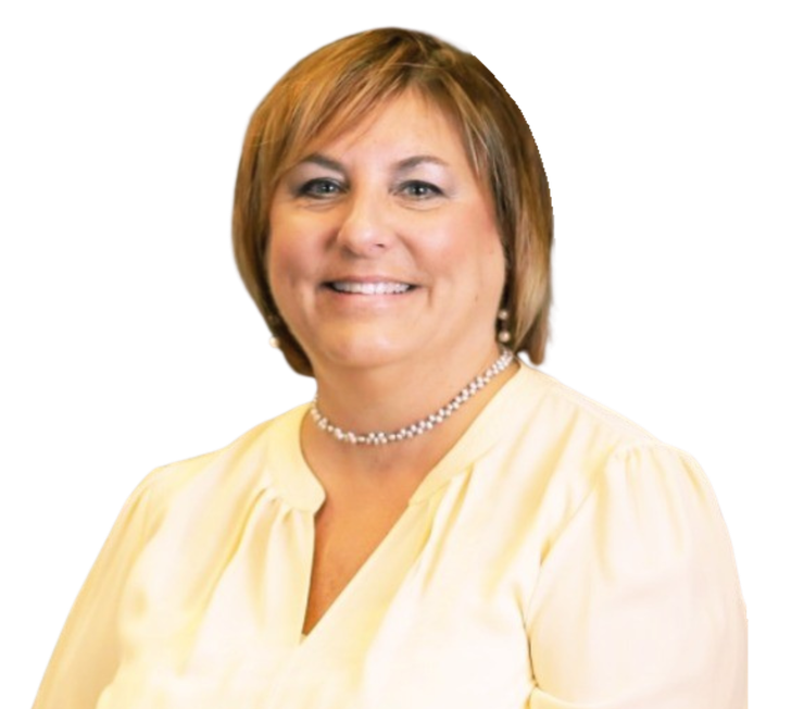 A woman wearing a white shirt and a necklace is smiling.
