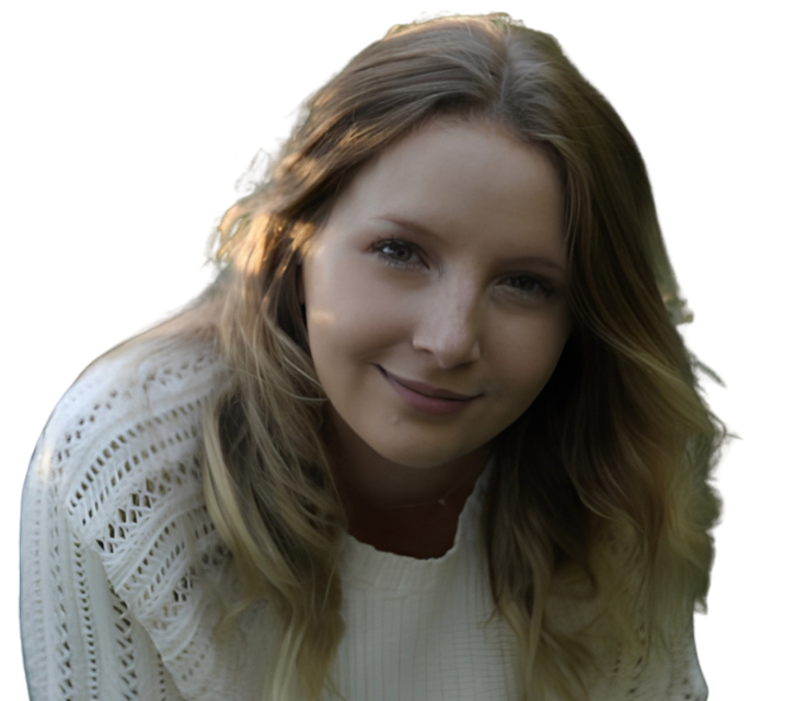 Smiling woman in a white sweater against a bright white background