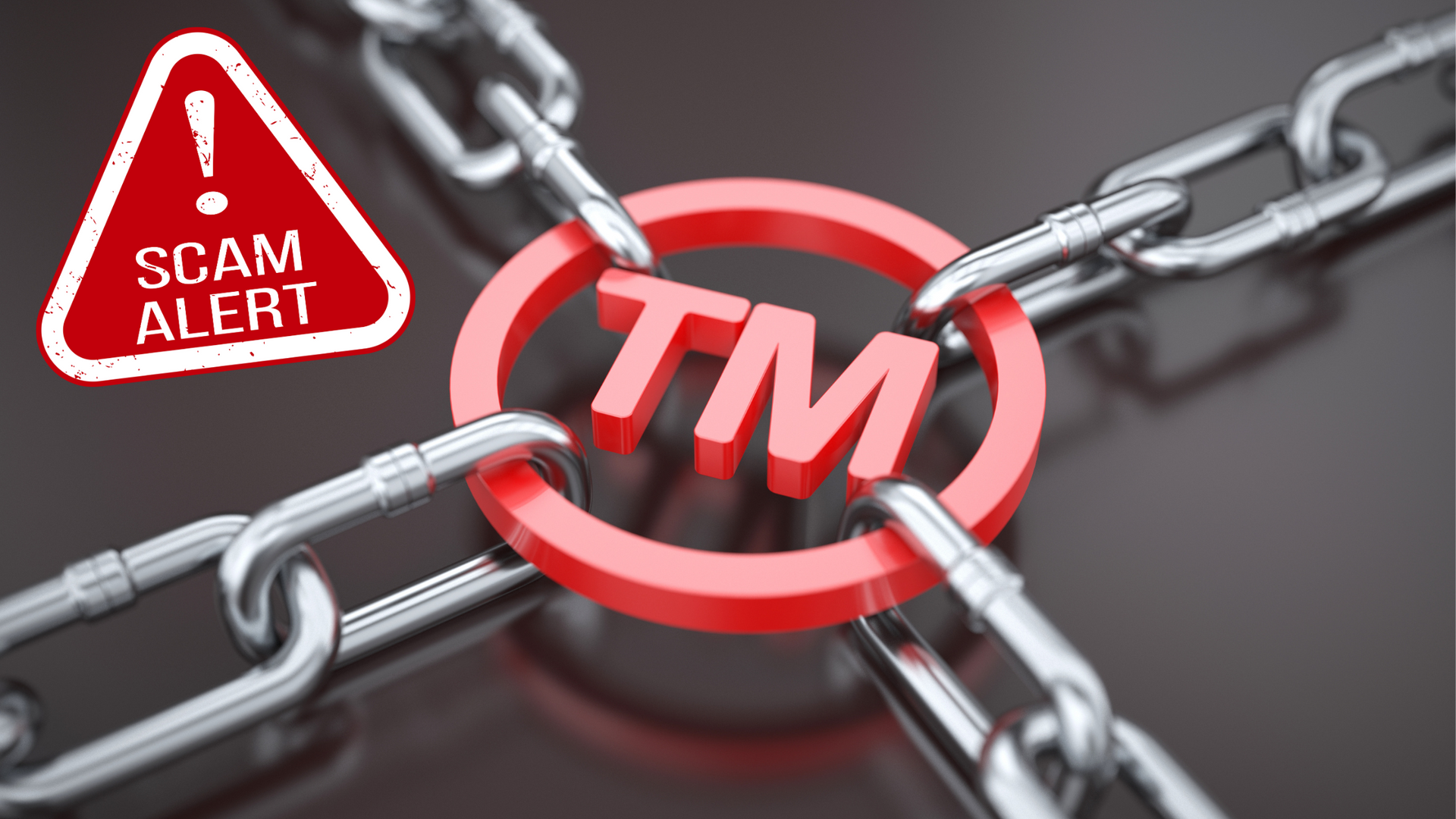 A red tm sign is surrounded by chains.