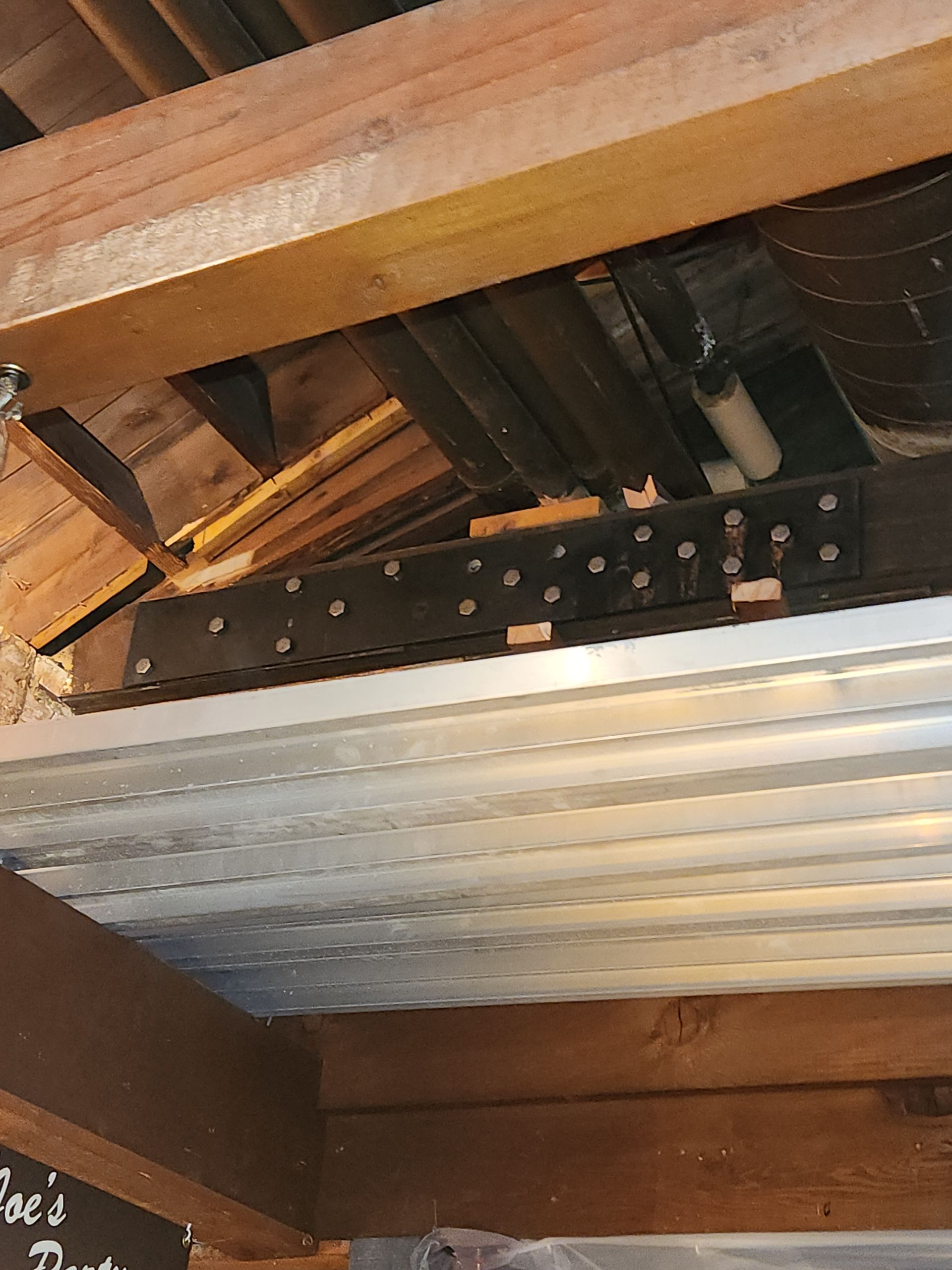 Mass timber truss strengthened with steel plates for durability in Oshkosh and Milwaukee DMAs
