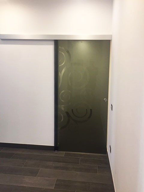 Porta scorrevole verde scuro