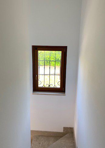 Finestra con grata