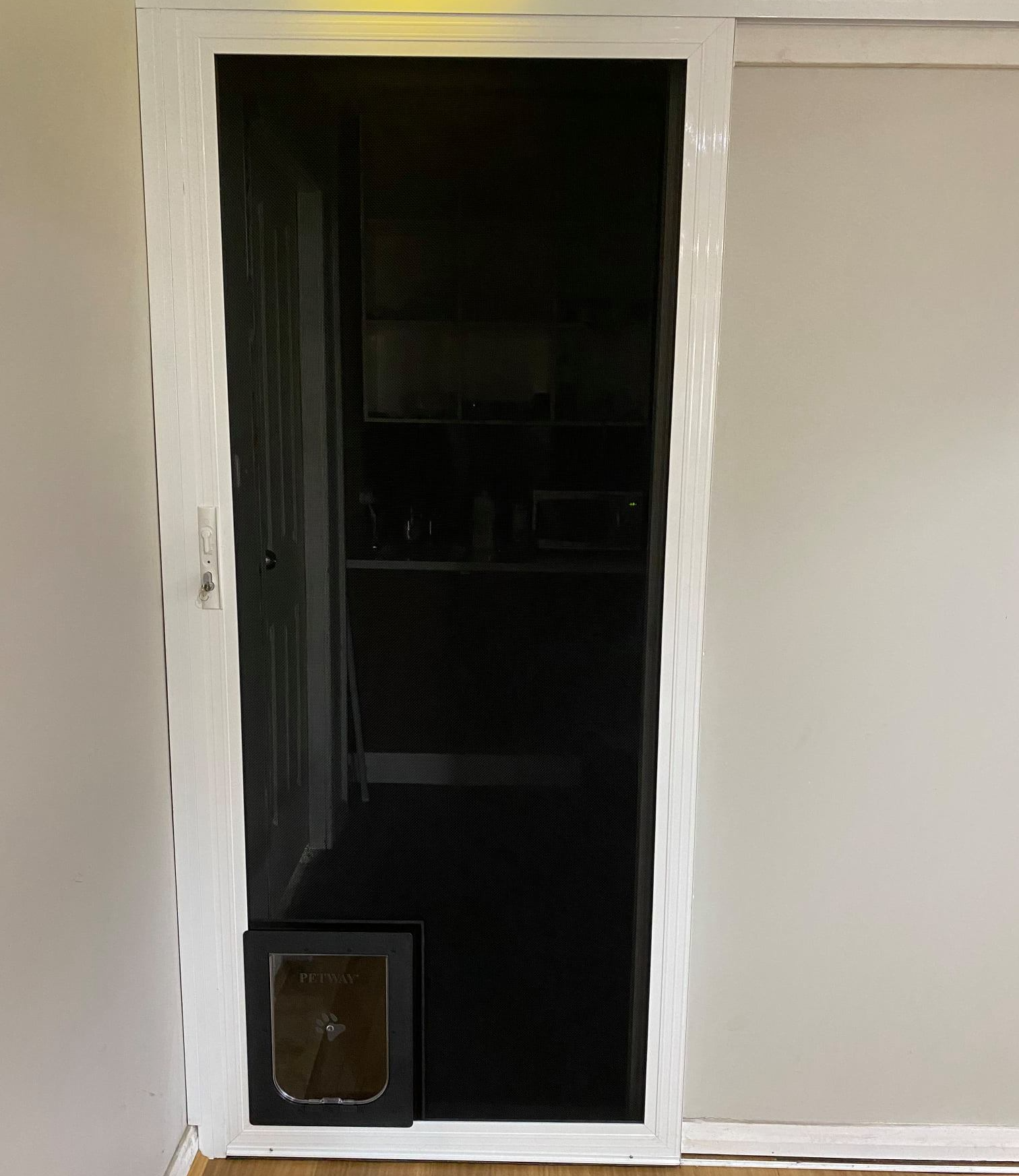 Crimsafe sliding door with pet door — GPW Security Screens NSW in Cardiff, NSW