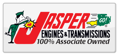 Logo for Jasper Engines & Transmissions, featuring a cartoon mechanic punching a spark, red and black text.