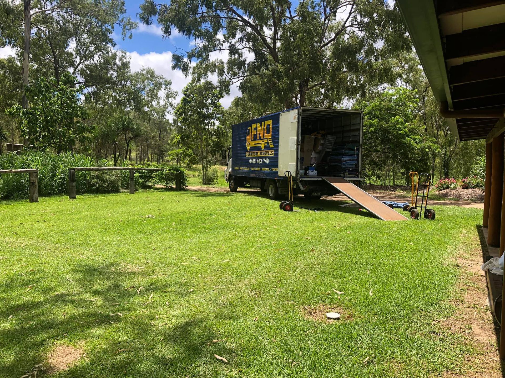 The Inside of a Moving Truck Filled With Boxes and Blankets — FNQ Furniture Removals in Stratford, QLD