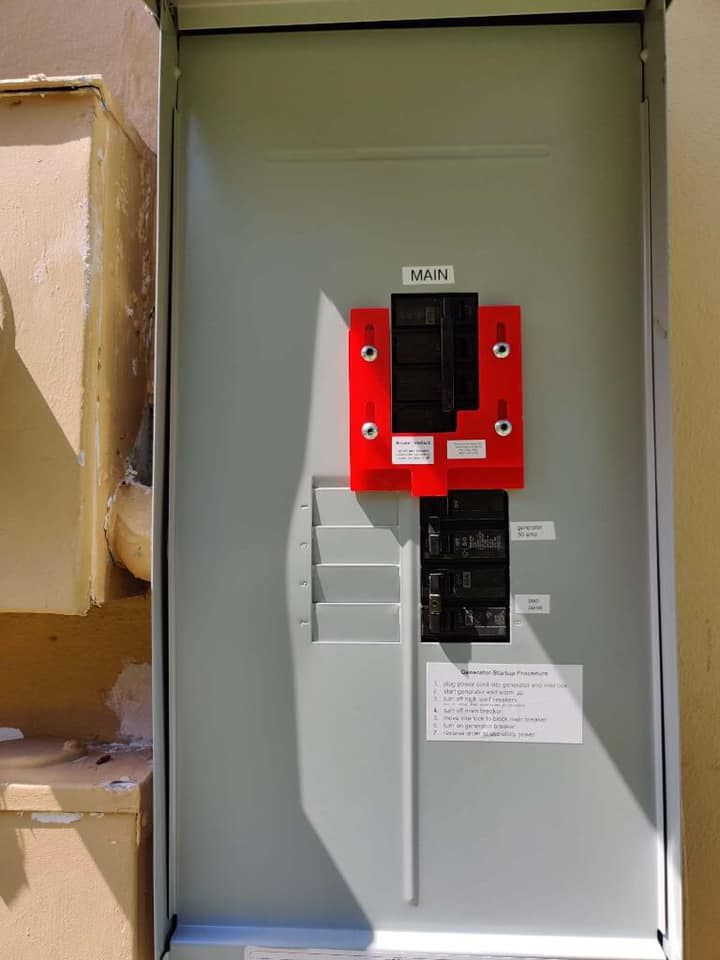 An electrical box with a red sticker on it that says ' a ' on it