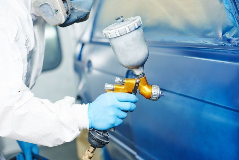 Painting Car Using Spray Compressor — Owensboro, KY — Cambron Body Shop