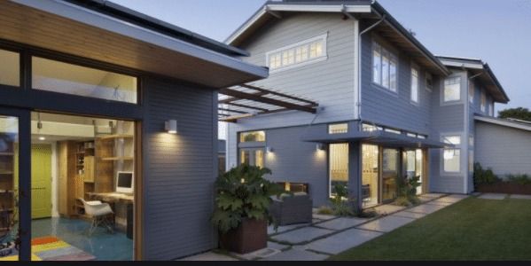 A Large House With A Lot Of Windows And Doors — On Guard Security & Communications In Wallsend, NSW