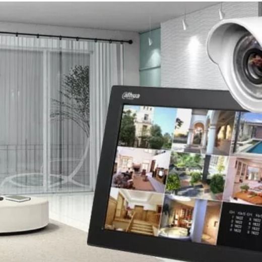 A Security Camera Is Sitting Next To A Dahua Monitor — On Guard Security & Communications In Wallsend, NSW