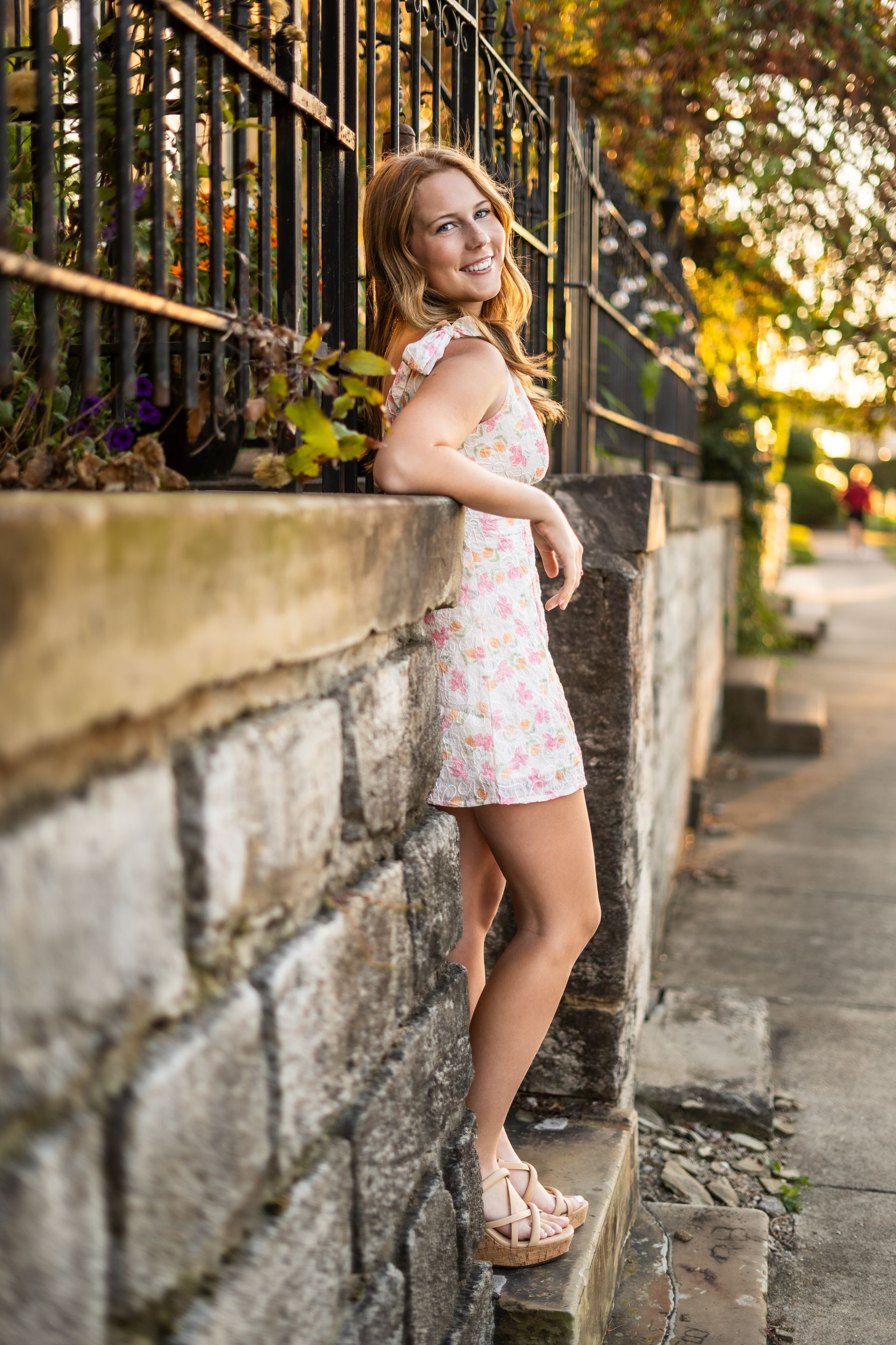 High School Senior girl posing during magic hour