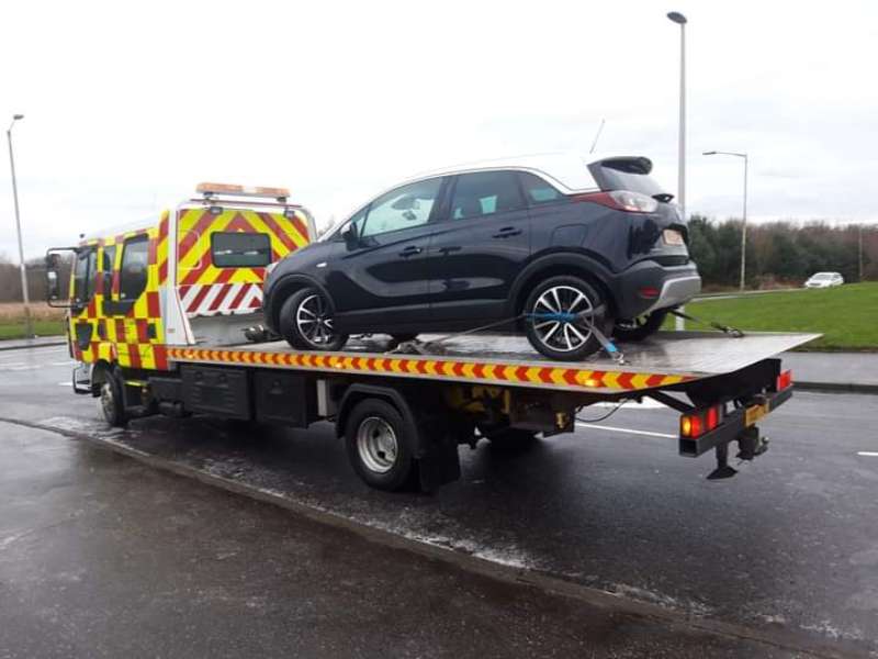 car on a recovery truck