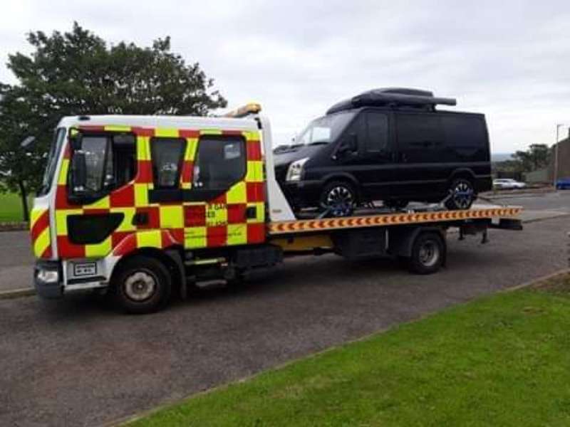 car on a recovery truck
