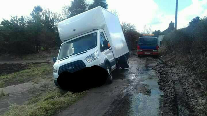 mini van gets off the road