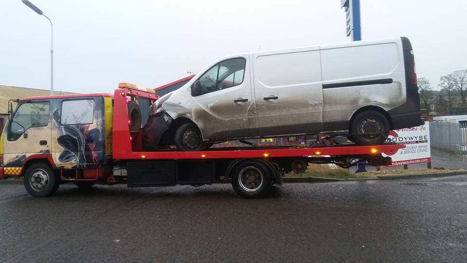 van on a recovery vehicle