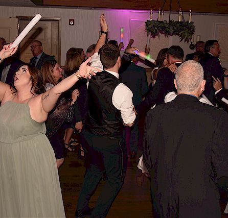 wedding guests dance at the bedford village inn New Hampshire