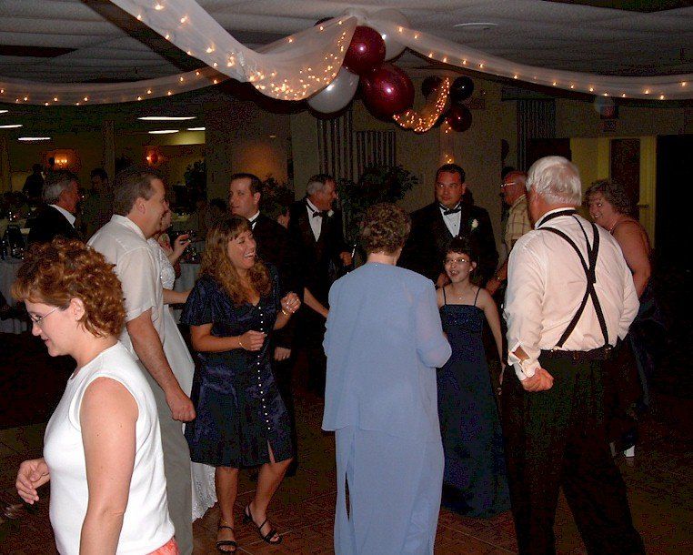 wedding guests DJ dancing at Presque Isle Inn & Convention Center, Presque Isle, Maine