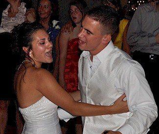 happy wedding couple dancing at Castleton, Winham, NH