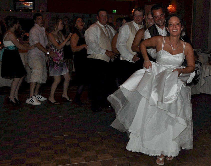 wedding guests dancing at church landing, meredith, New Hampshire