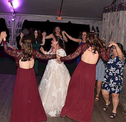 bride dancing at wedding at flag hill winery, lee, New Hampshire
