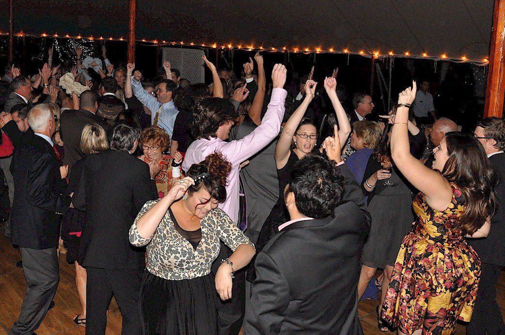 DJ wedding guests dance at Wentworth By The Sea Country Club of New Castle, NH