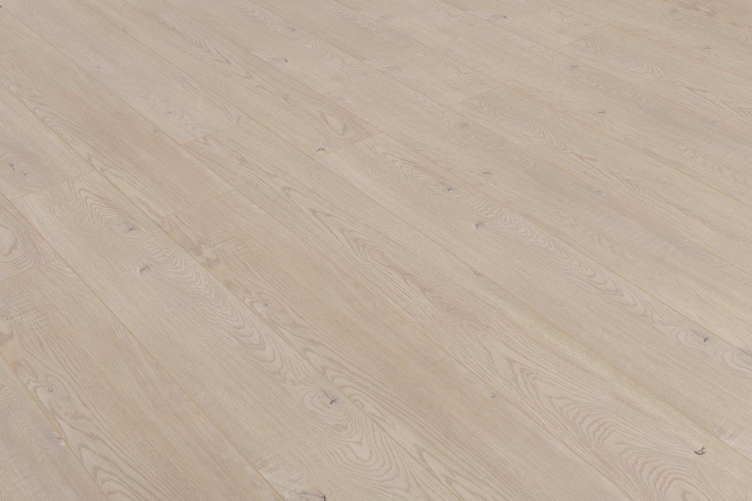 a close up of a white laminate flooring with a diagonal pattern .