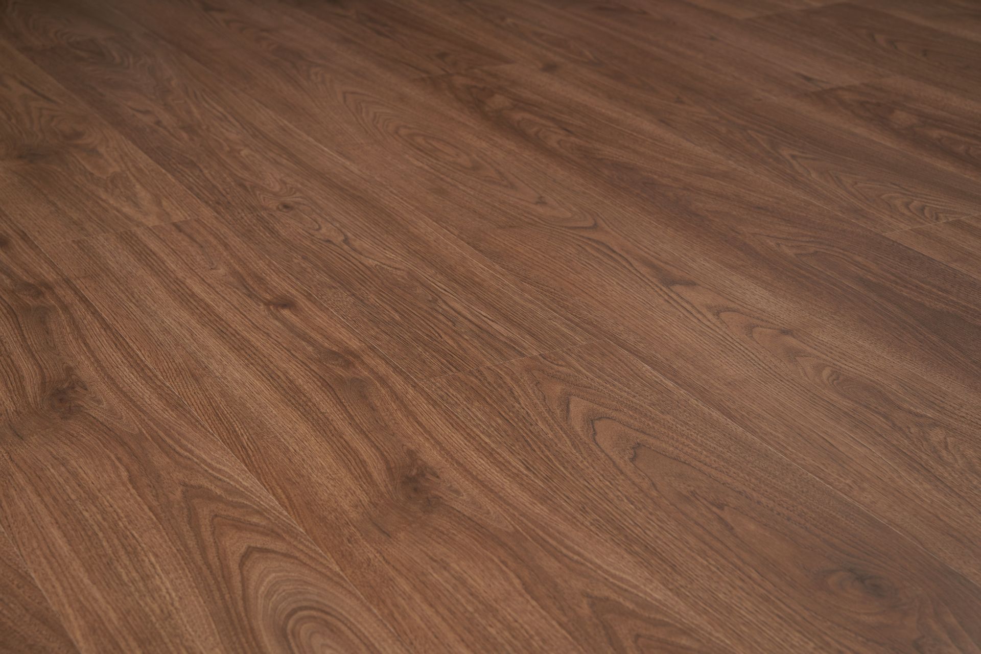 A close up of a laminate flooring in a room.