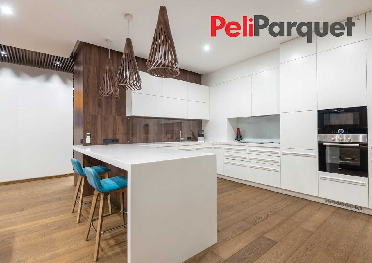 Close-up of Picasso Barrel Oak laminate planks showcasing wood grain texture