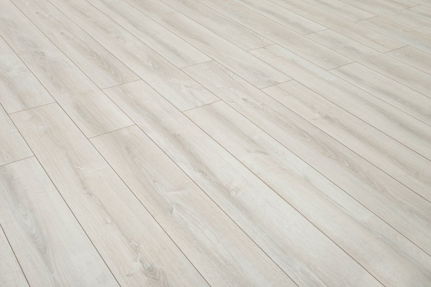 a close up of a white laminate flooring in a room .