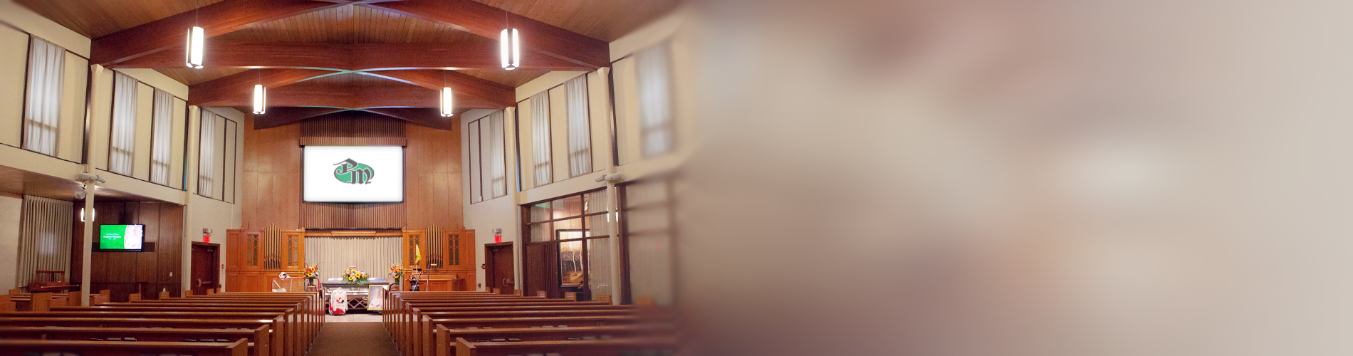 A spacious and naturally lit chapel decorated in hardwood - Park Memorial has the largest naturally lit chapel in Edmonton