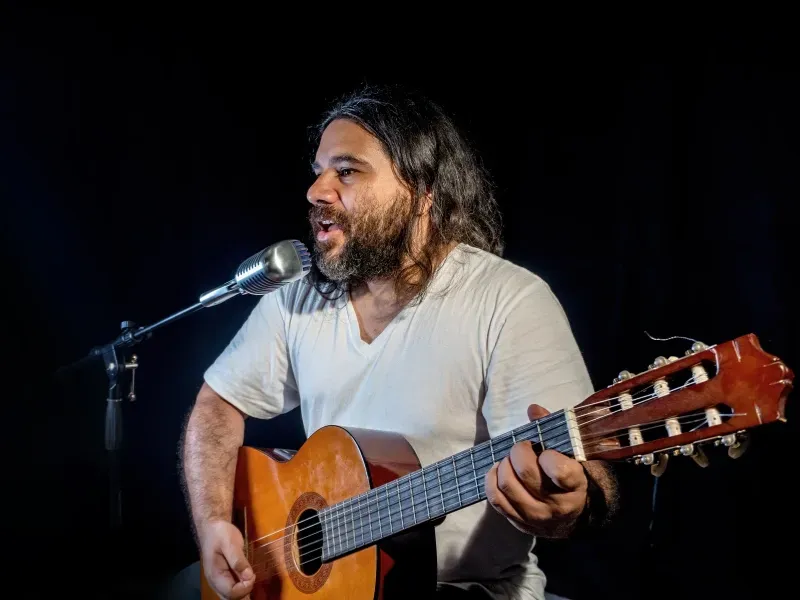 Image of showing a professional guitar player.