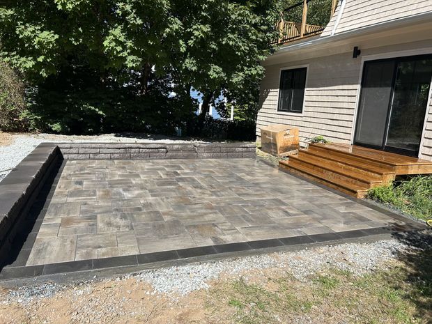 backyard patio with wooden steps