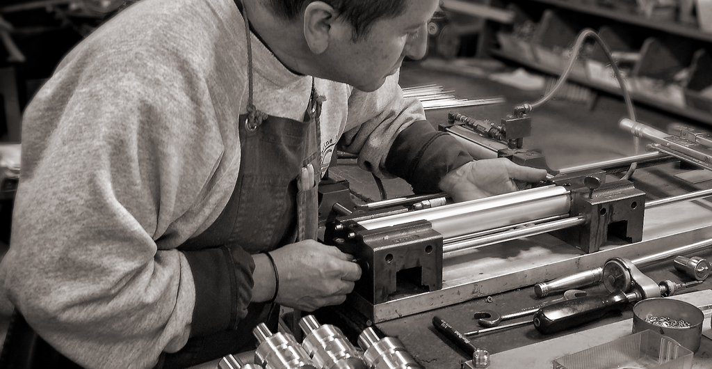 photo of a worker manufacturing an air cylinder