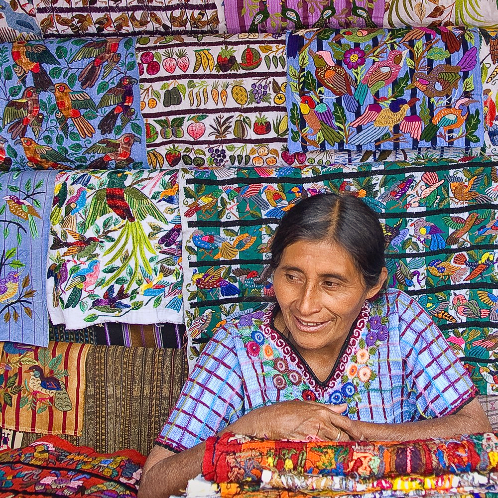 image of a woman selling cloth in central America