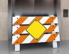 Image of no entry sign in front of broken lift