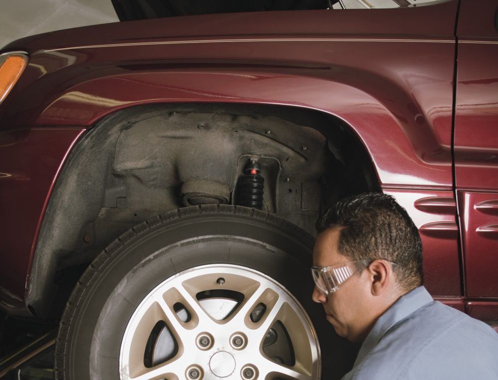 Removing a tire at our collision center in Jackson, CA