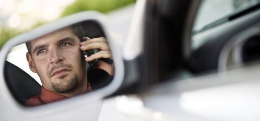 Man calling one of our auto body repair specialists in Jackson, CA